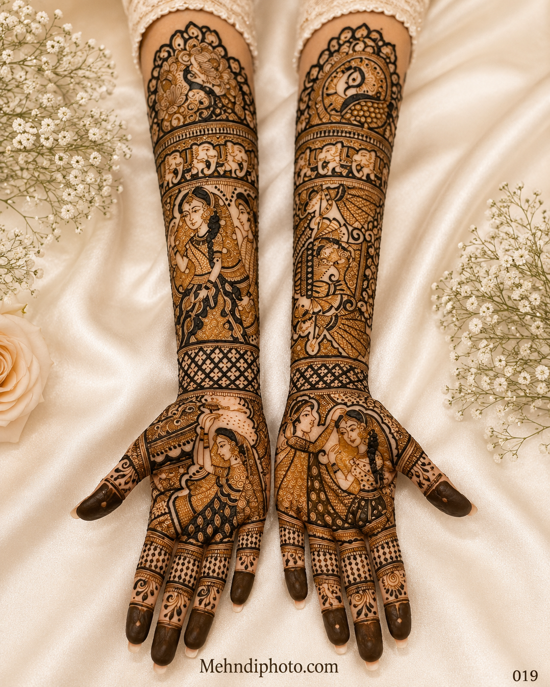 Full hand bridal mehndi design on both palms and forearms featuring lotus-filled paisley motifs, floral arches, jaali patterns and dark fingertips.