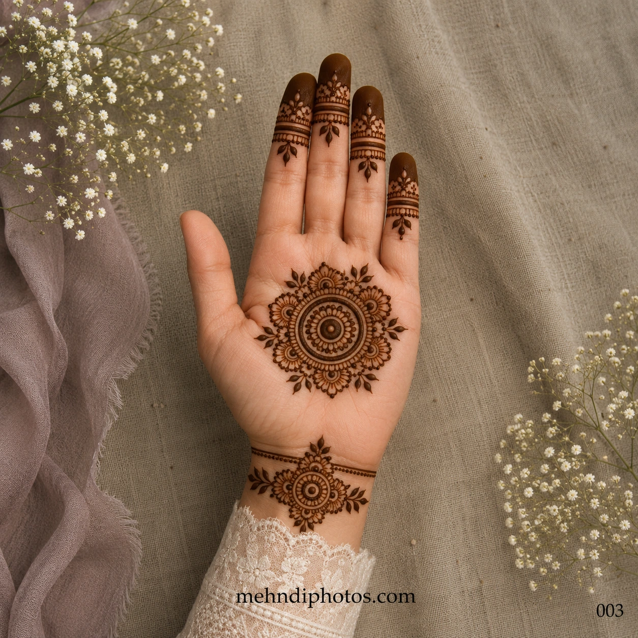 Simple finger mehndi design with a floral mandala on the palm, elegant fingertip patterns, leafy accents, and a matching floral wrist motif in traditional Indian henna style.