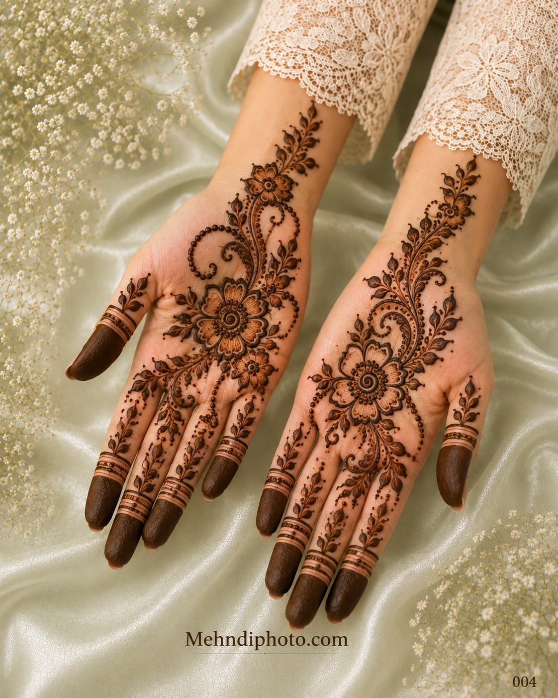 Floral vine front hand mehndi design on both palms with shaded flowers, leafy branches, paisley curves, dotted details and dark fingertips.