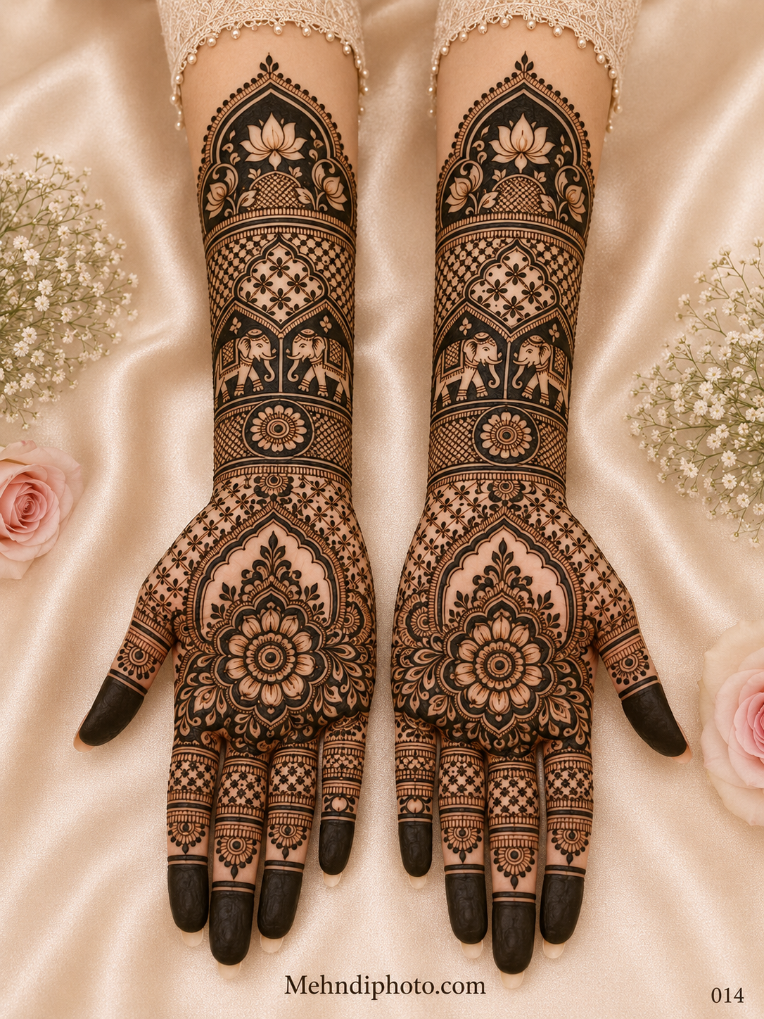 Full hand bridal mehndi design on both palms and forearms featuring royal elephants, lotus motifs, floral mandalas, jaali patterns and dark fingertips.