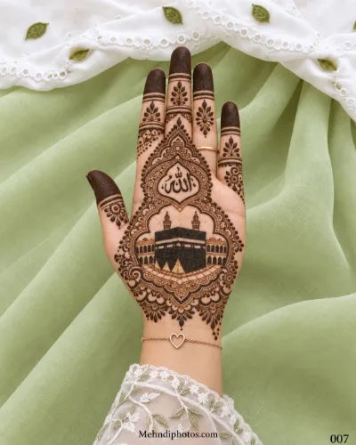 Front hand with an Islamic mehndi design featuring the Kaaba, mosque architecture, Allah calligraphy, floral borders and leafy finger motifs.