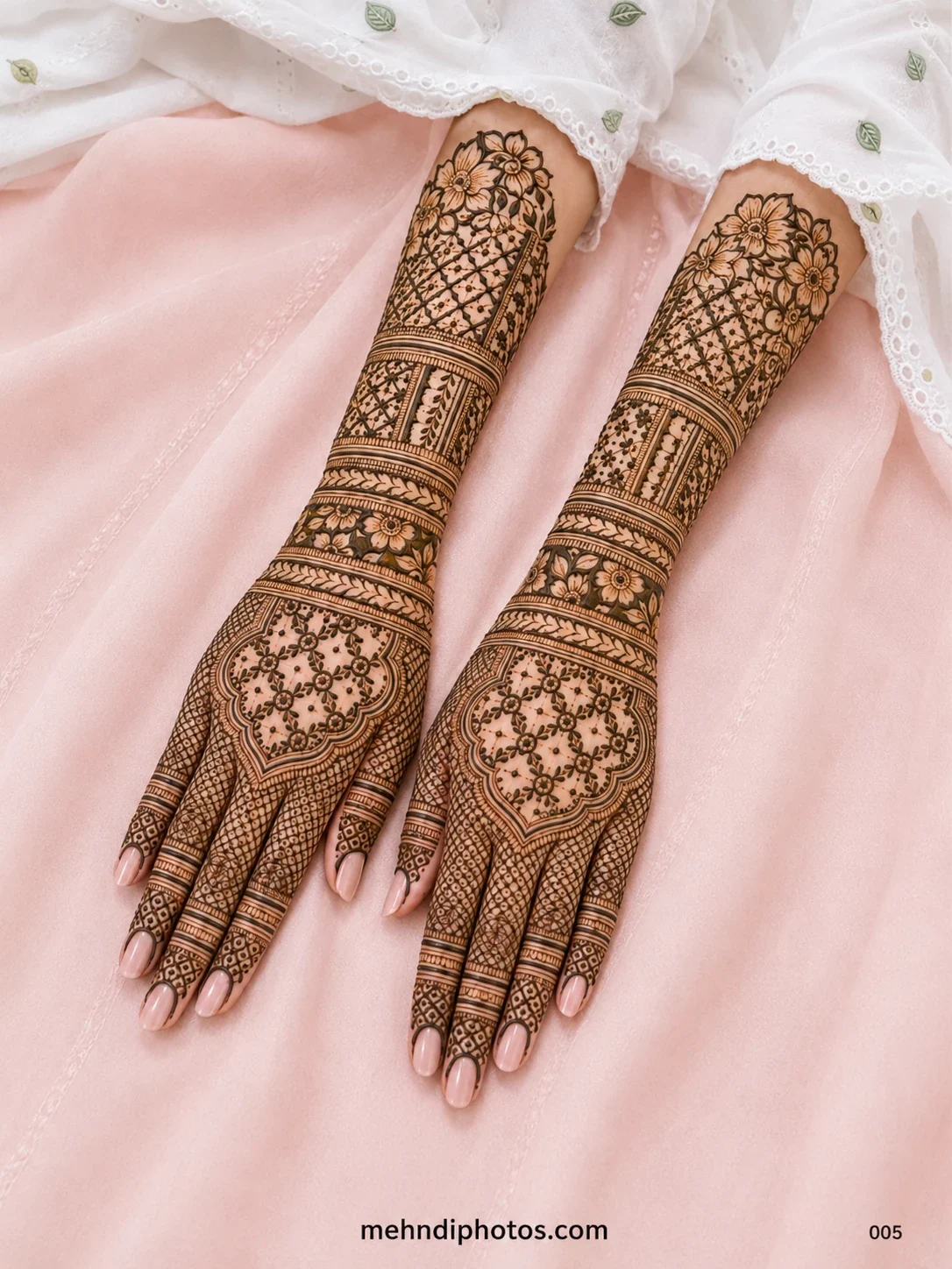 Elegant floral net mehndi design with intricate lattice patterns on both hands