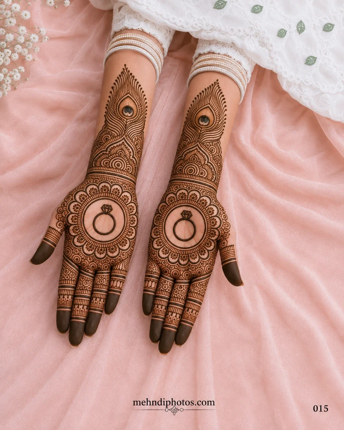 Engagement full hand mehndi design featuring matching ring motifs, peacock feather patterns and intricate floral details on both palms.