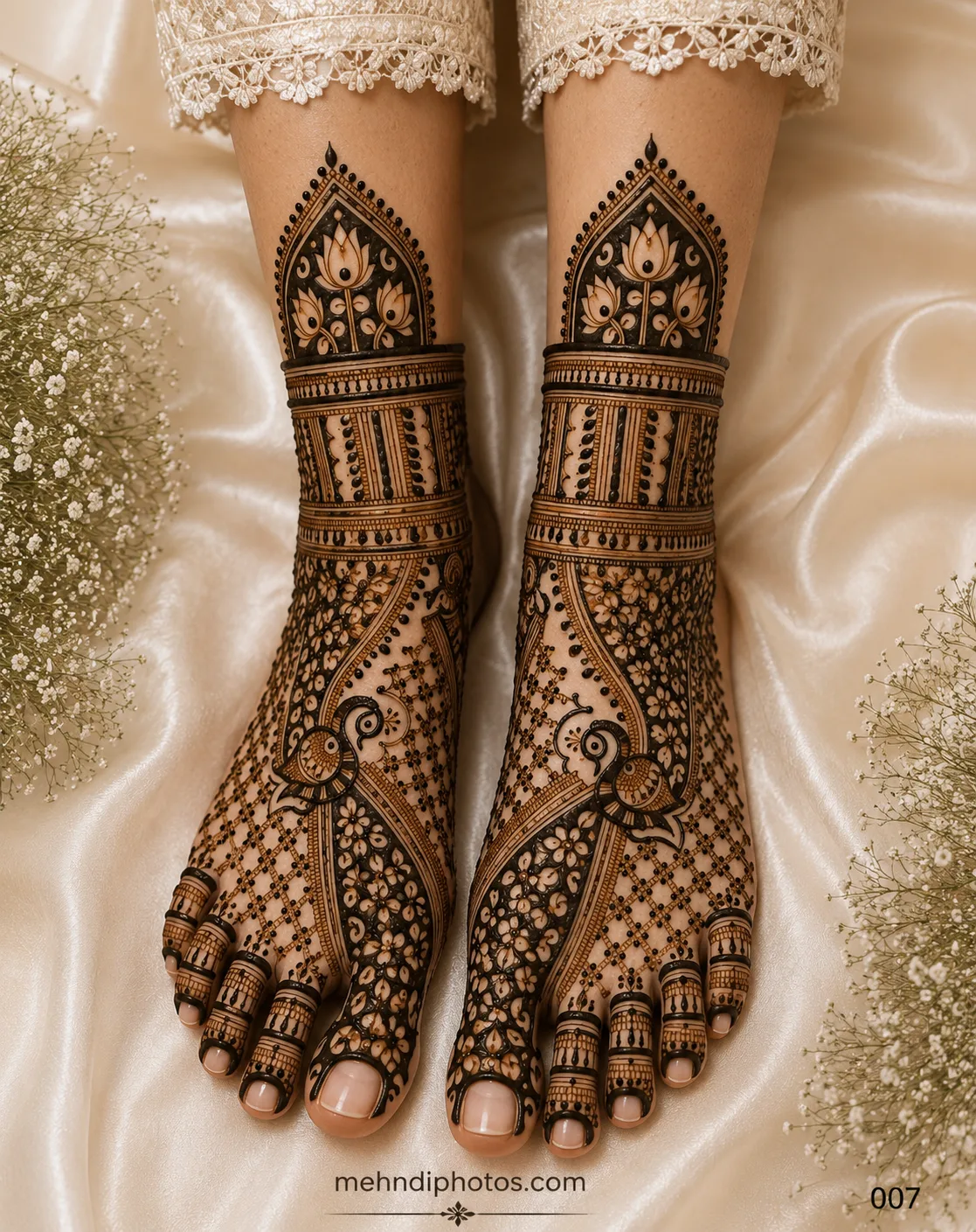 Bridal foot mehndi design on both feet featuring peacock motifs, lotus arch patterns, floral jaali work, ornamental ankle bands and decorated toes.