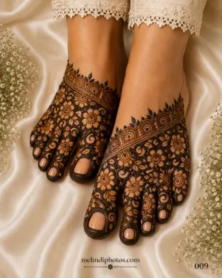 Heavy floral foot mehndi design with intricate flowers, leafy vines, decorative borders, and full feet henna pattern for brides and festive occasions.
