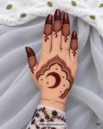 Eid back hand mehndi featuring a crescent moon and stars beneath a mosque-inspired arch with dark fingertips and netted finger panels.
