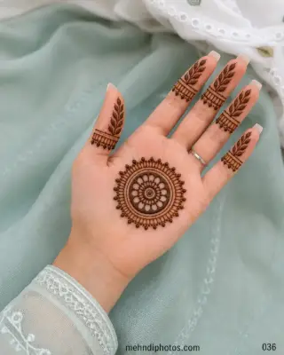 Discover an elegant front hand mehndi design with a floral mandala, leafy fingers and hanging details, ideal for Eid, Teej and festive occasions.