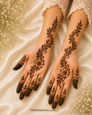 Simple floral vine front hand mehndi design with elegant leafy patterns and easy full hand Indian mehndi extending from palm to forearm for girls and women.