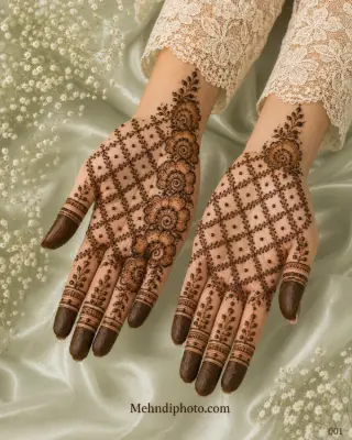 Floral jaali front hand mehndi design on both palms with diagonal flowers, leafy vines, dotted lattice patterns and dark shaded fingertips.