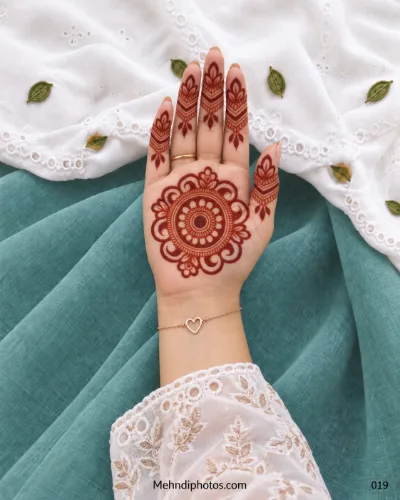 Front hand with spiral floral gol tikki and lotus finger panels