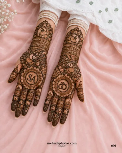 Royal peacock bridal mehndi design with intricate floral and mandala patterns on both hands